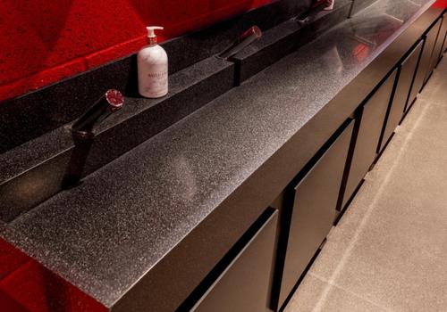 Solid Surface Wash Trough in a hospitality washroom
