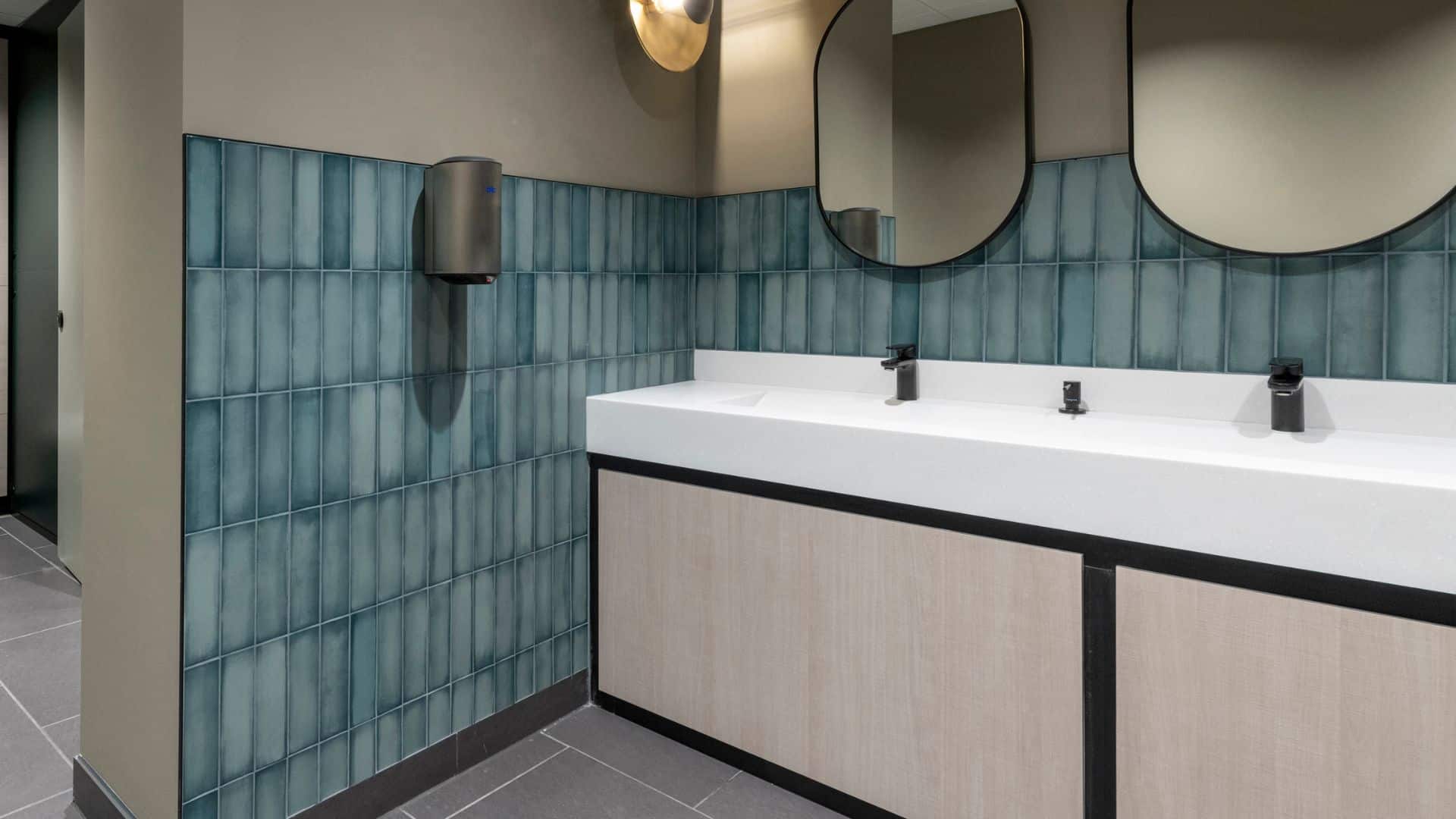 White Solid Surface Wash Trough in commercial washroom